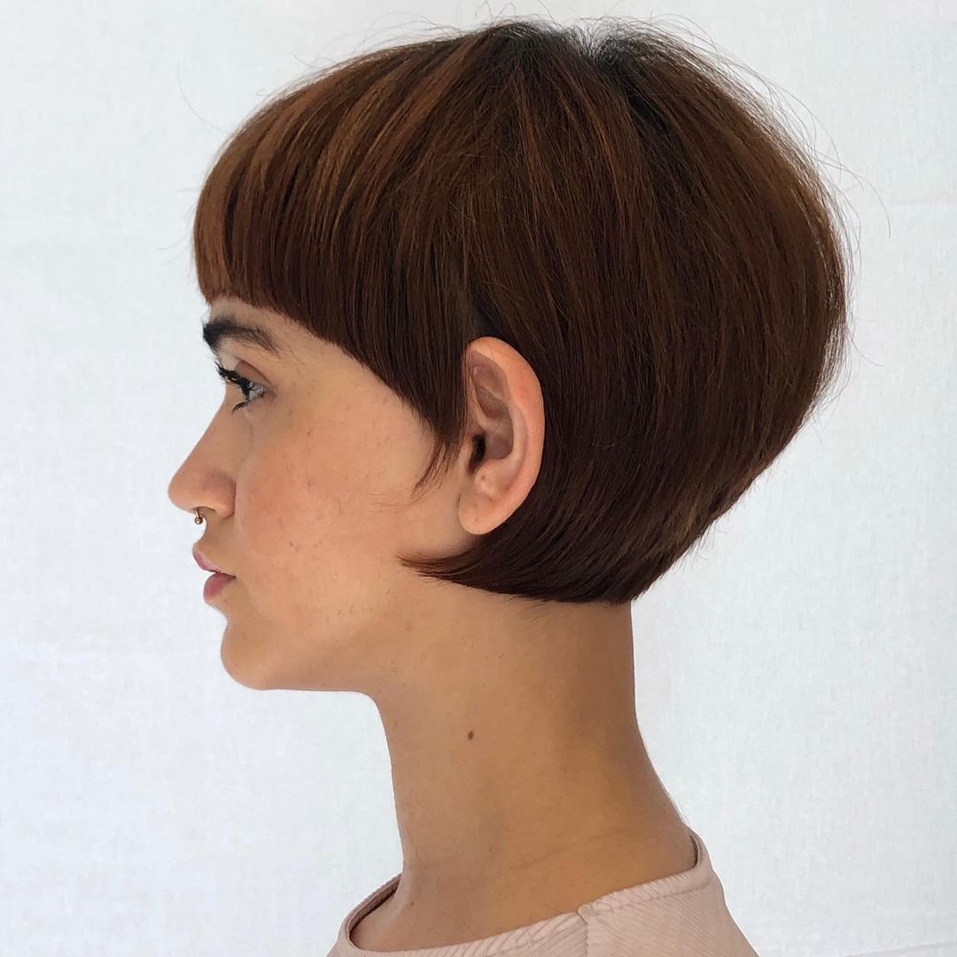 Edgy Haircut with Rounded Form and Precision Cut Bangs